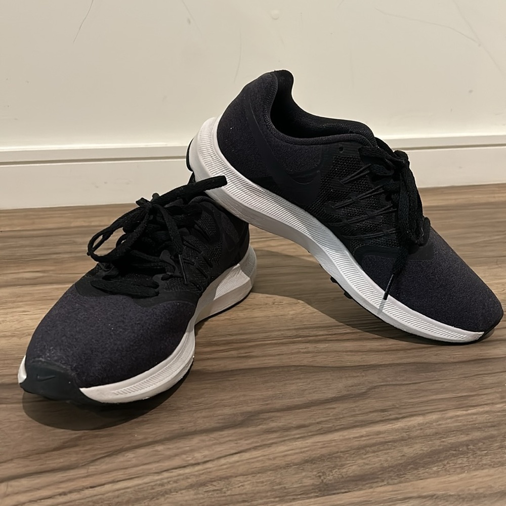 Women’s Nike Run Swift athletic shoes. Size 8.5. Only worn a handful of times.